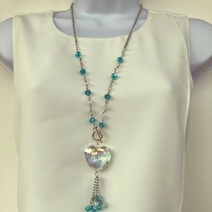 Gorgeous necklace with crystal beads and pendant.